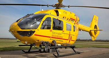 Yellow East Anglia Air Ambulance helicopter